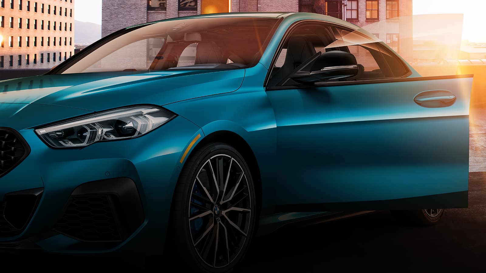 The sleek appearance of this BMW Gran Coupe is enhanced by the clean, frameless door design.